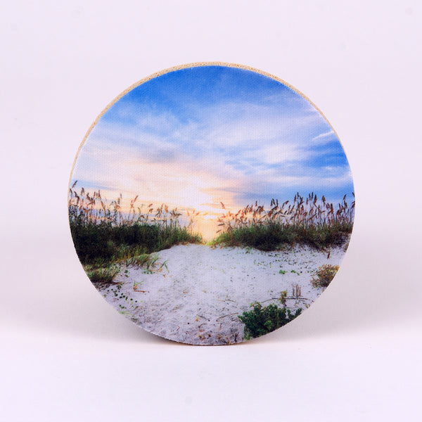 Sunrise on the beach photograph on round rubber home coasters