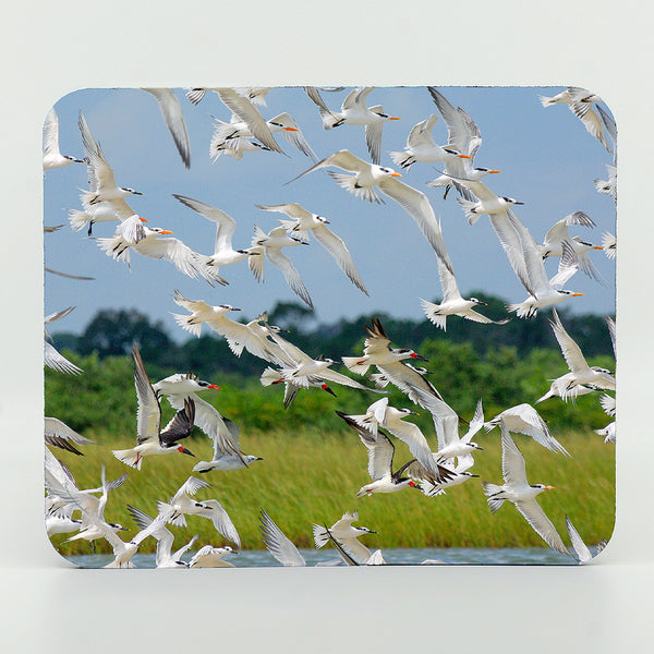 A flock of birds photograph on a mouse pad