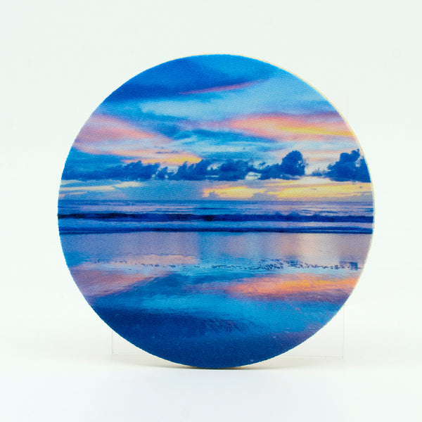 Early morning sunrise over the ocean sea photograph on a round rubber home coasters