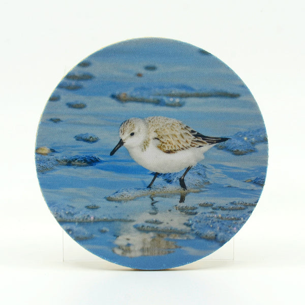 Sandpiper on the beach photograph on a round rubber home coaster