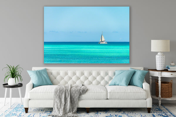 A sailboat taking tourists for a peaceful ride  Photograph