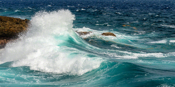 A photo of large crashing waves along the rocky windward coast on the island of Curacao
