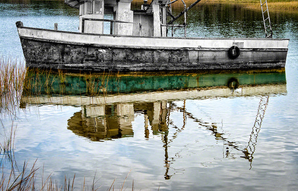 A photo of an old shrimp boat