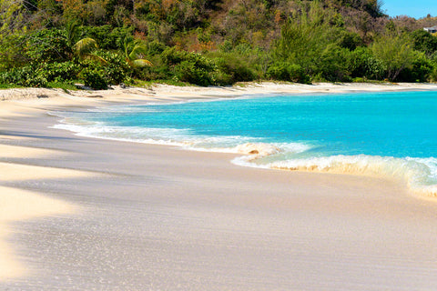 A photo of the surf and sand at beautiful Valley Church Beach in Antigua