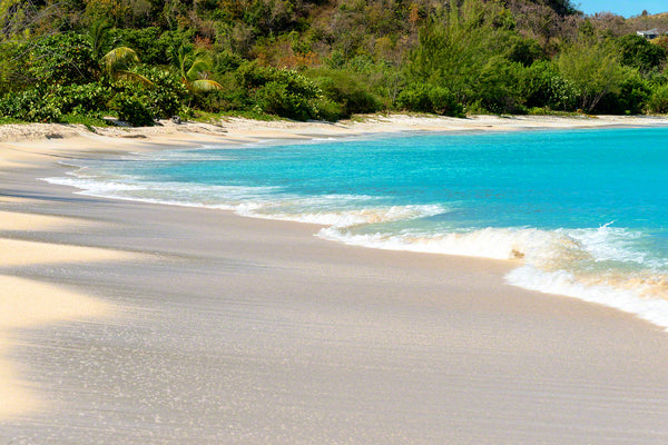 A photo of the surf and sand at beautiful Valley Church Beach in Antigua