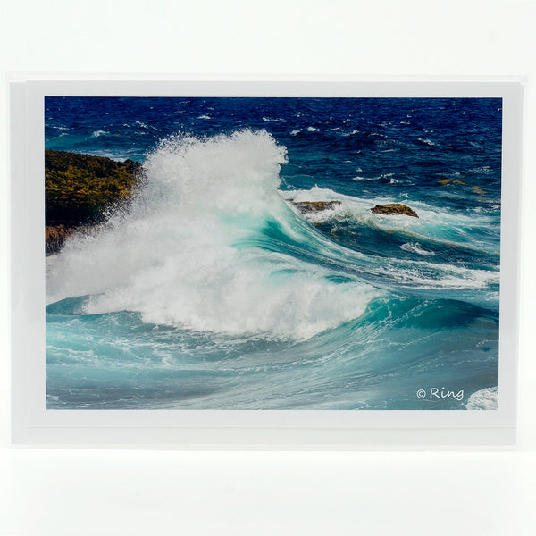 Wave crashing on the shore photograph on a greeting card
