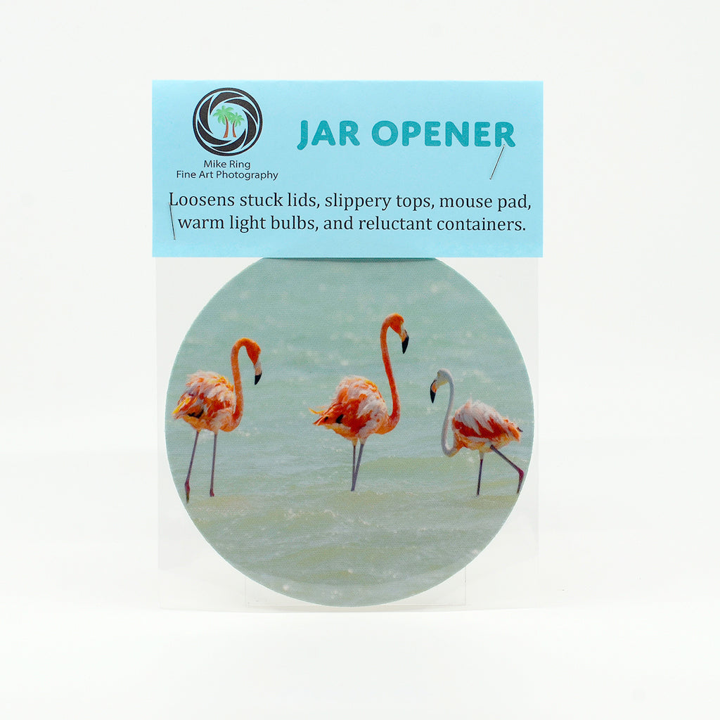 A flock of flamingos in a salt pan in the Caribbean photograph on a jar opener