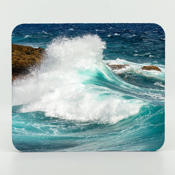 Wave crashing on the shore photograph on a mouse pad