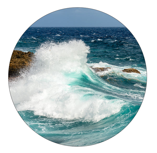 Wave crashing on the shore photograph on a round rubber home coaster