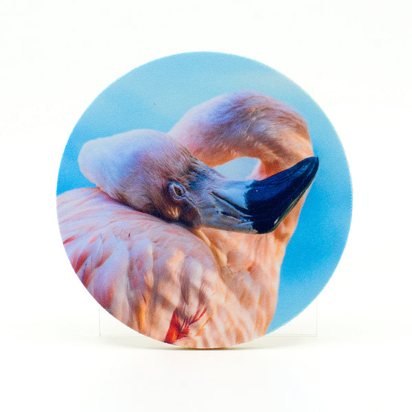 A flamingo sleeping photograph on a round rubber home coaster