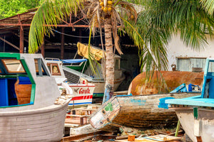 A photo of a group of rustic boats in a boat yard in Cojimar, Cuba