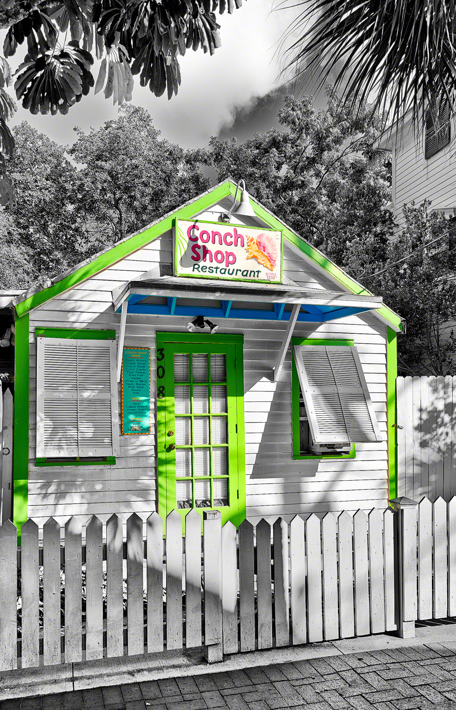 a photo of a  small colorful conch shack in Key West, Florida
