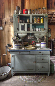 A photo of an old canning and baking hutch