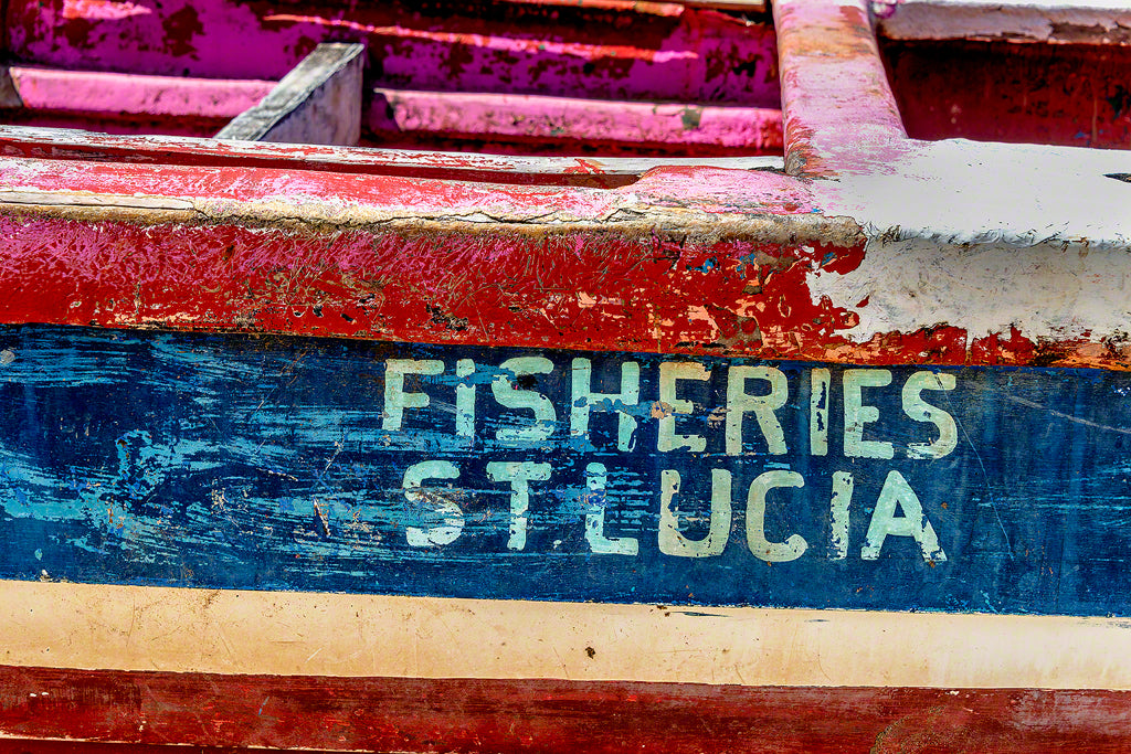 A colorful rustic fishing boat ready for the next adventure