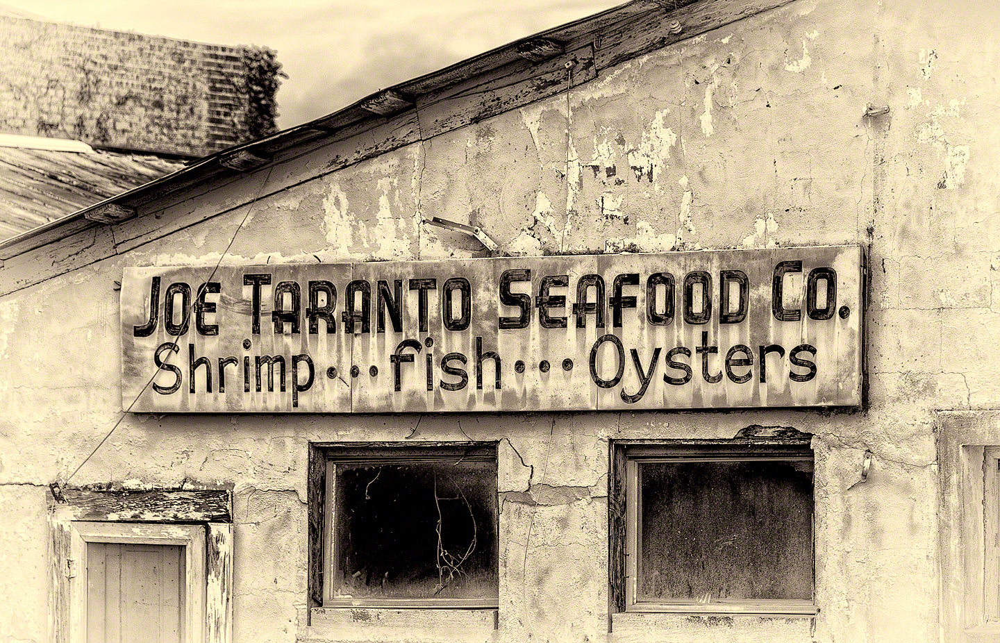 A Landscape Fine Art Photograph by Mike Ring of an old rustic seafood house.