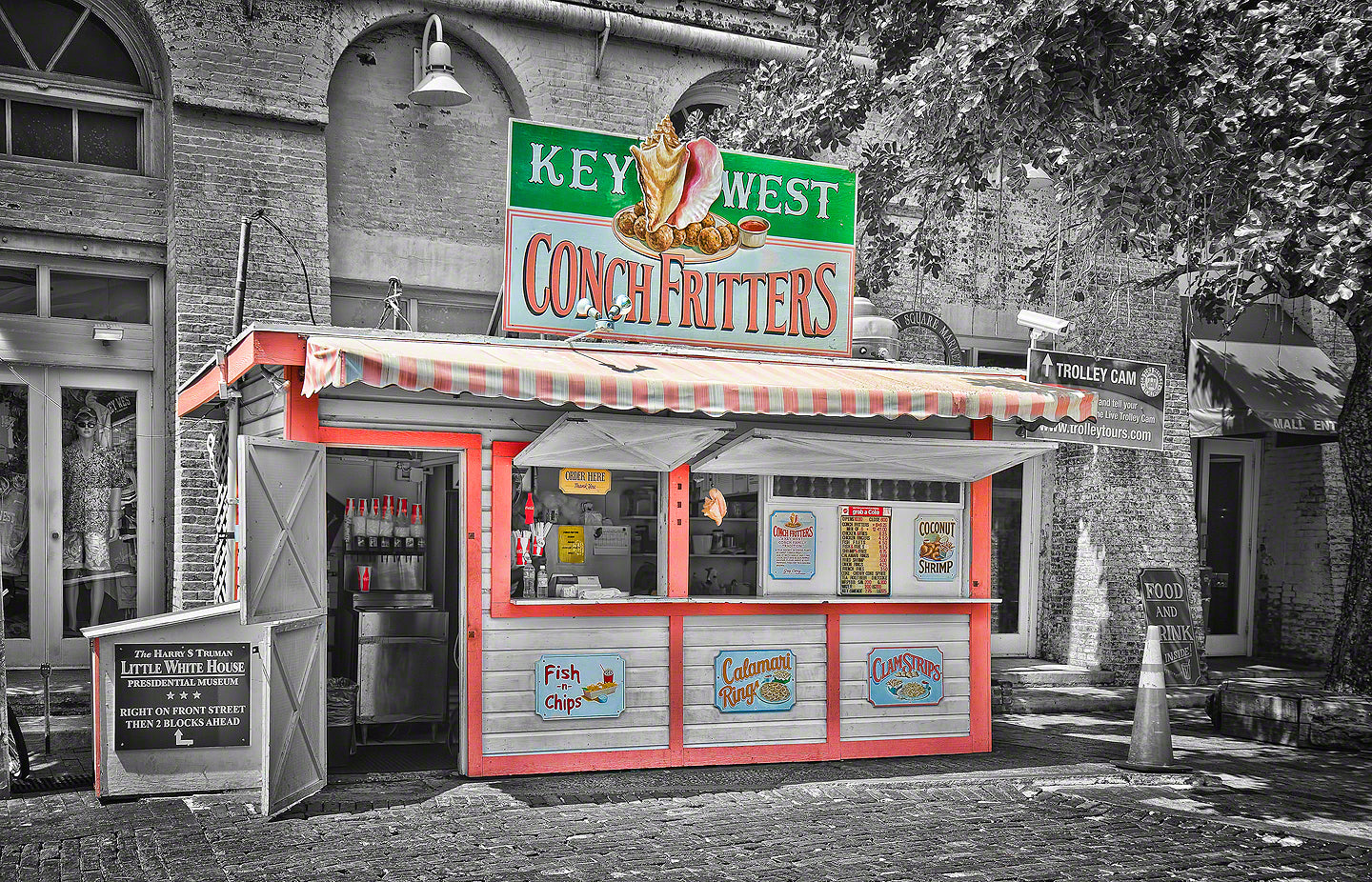 A photo of a colorful conch fritter stand in Key West, Florida