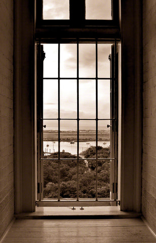 A photograph by Fine Art Photographer Mike Ring looking out of the St. Augustine Lighthouse to the sea