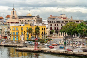 A photo of colorful Cuban buildings along the Malecon road