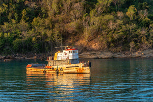 A photo of a old Tug Boat anchored in St. Lucia